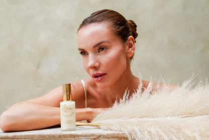 person with luxury natural skincare cleanser